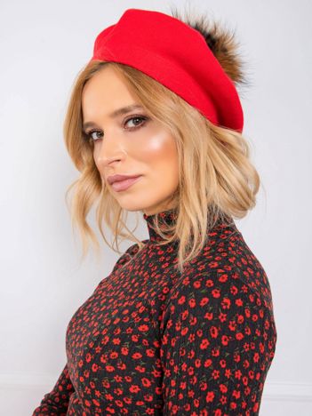 Red knitted beret with pompom